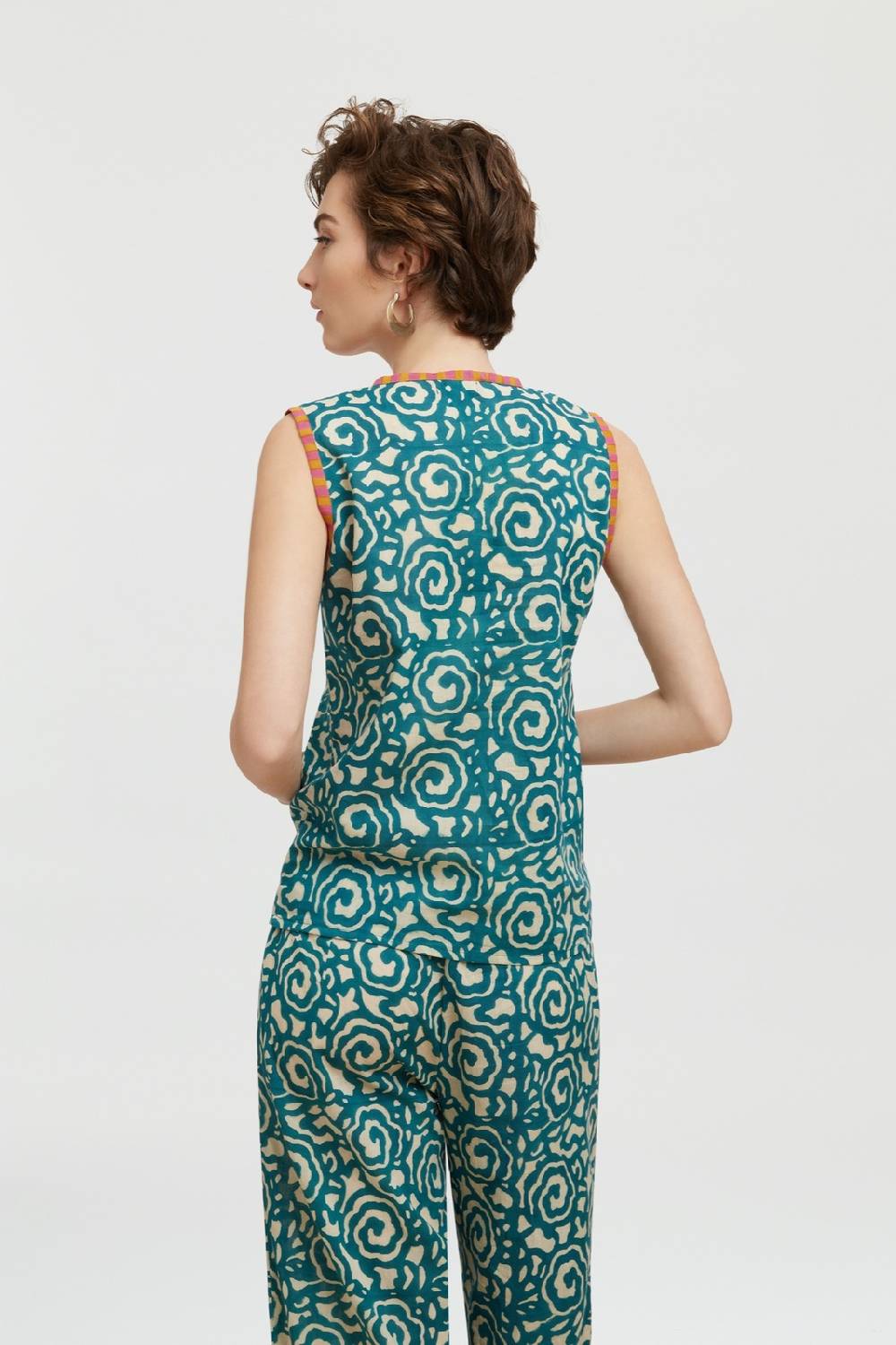 Lisa Corti top banyan spiral peacock natural Promozione