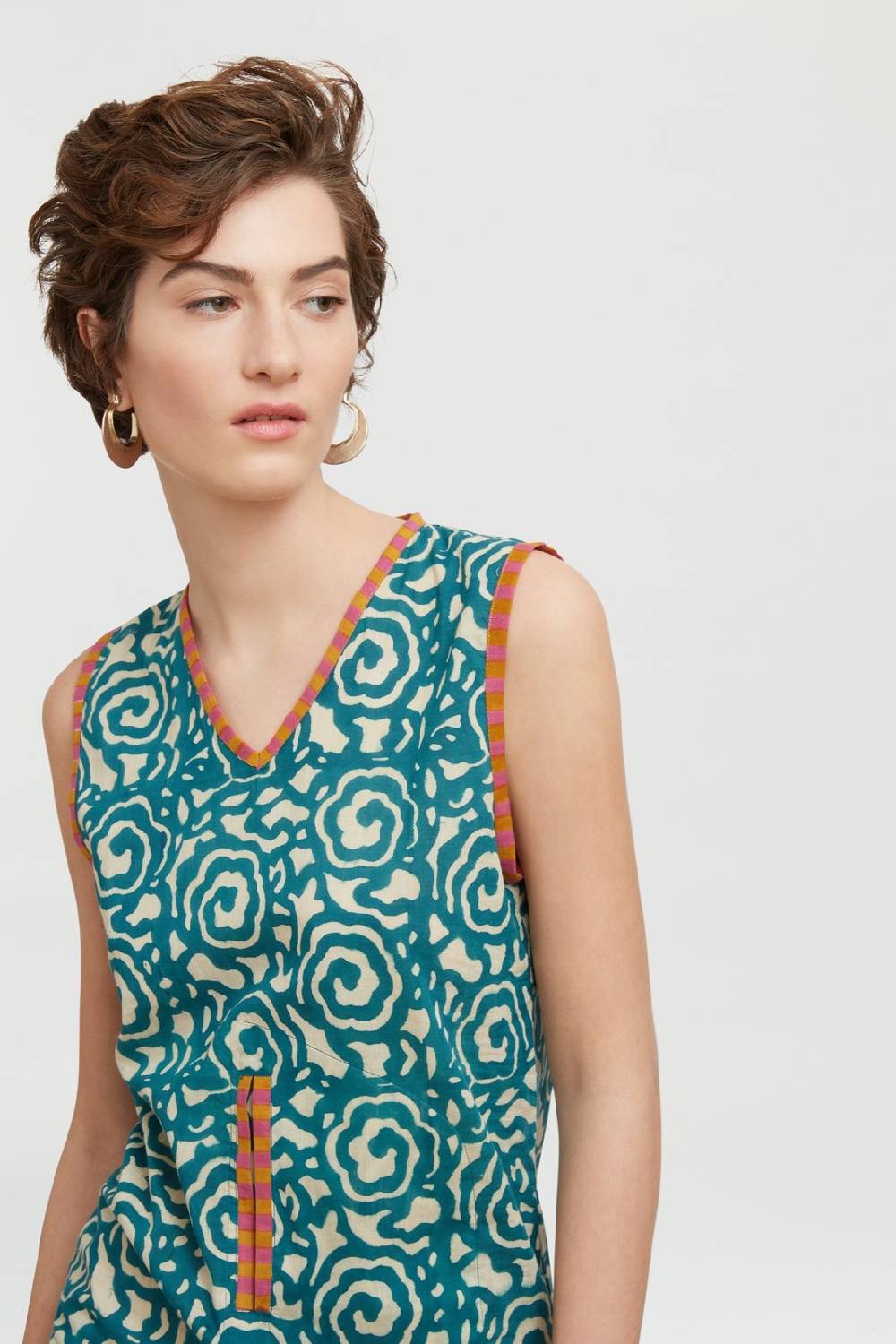 Lisa Corti top banyan spiral peacock natural Promozione