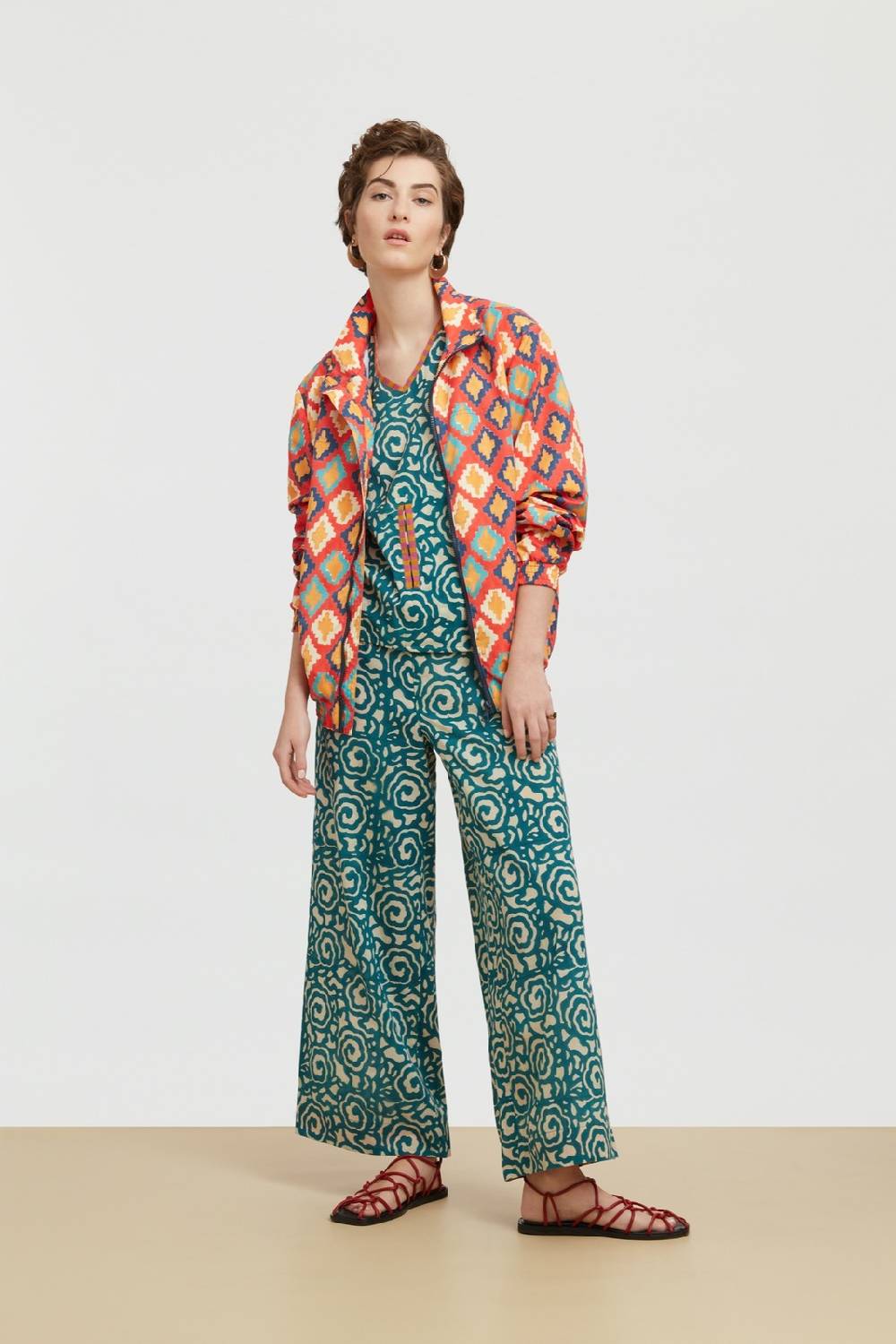 Lisa Corti top banyan spiral peacock natural Promozione