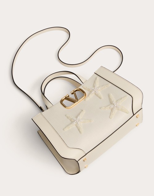 Red Valentino BORSA PICCOLA A MANO VALENTINO GARAVANI ESCAPE IN RAFIA CON RICAMO Negozio