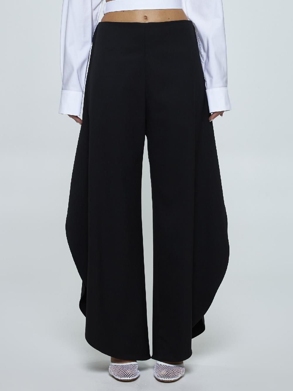 ALAÏA Pantaloni Round in lana stretch Spedizione Gratuita