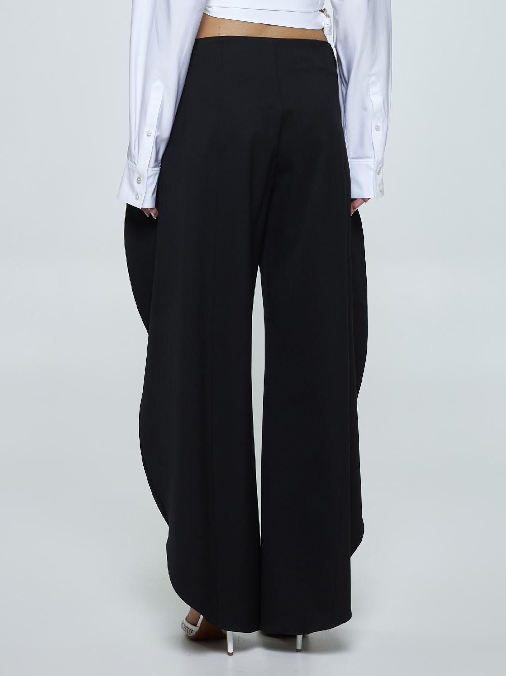 ALAÏA Pantaloni Round in lana stretch Spedizione Gratuita