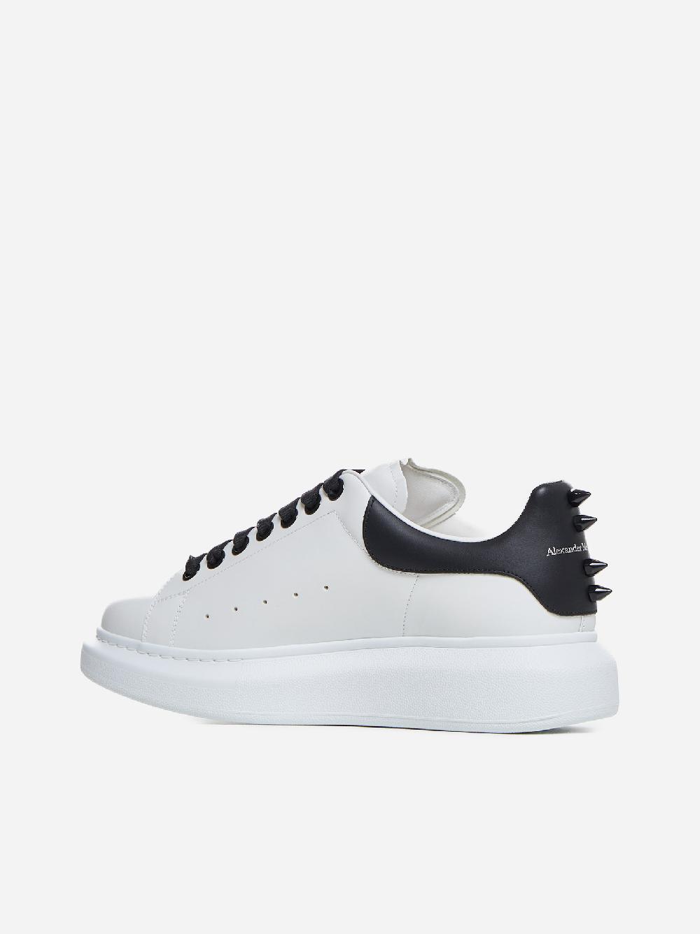 ALEXANDER MCQUEEN Sneakers Oversize in pelle con borchie 2025