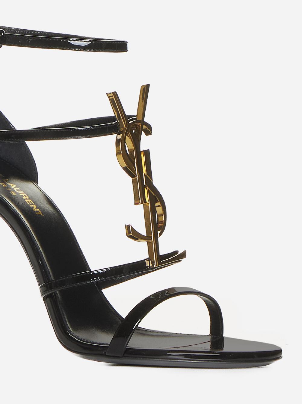 SAINT LAURENT Sandali Cassandra in vernice con logo YSL Convenienza