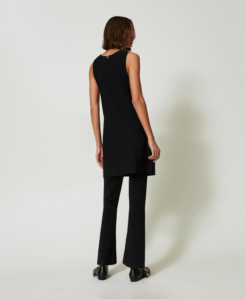 Scee by twin set Pantaloni flare in maglia Ultimi tre giorni