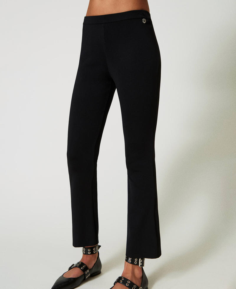 Scee by twin set Pantaloni flare in maglia Ultimi tre giorni