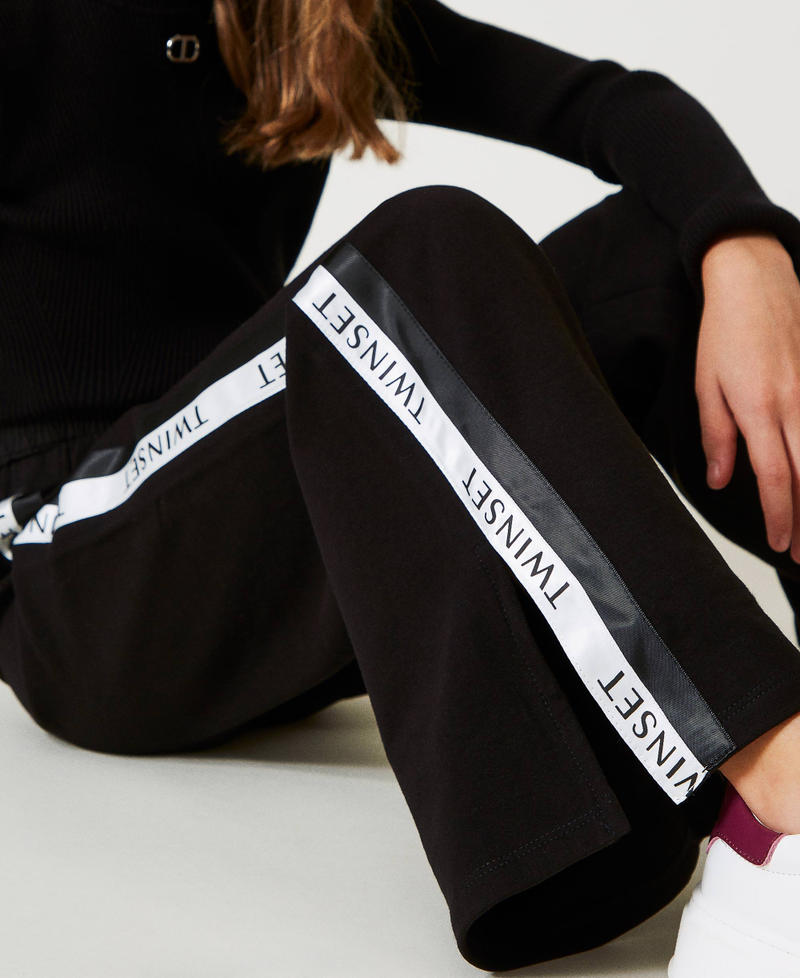 Scee by twin set Pantaloni a palazzo in felpa con logo Ultimo giorno