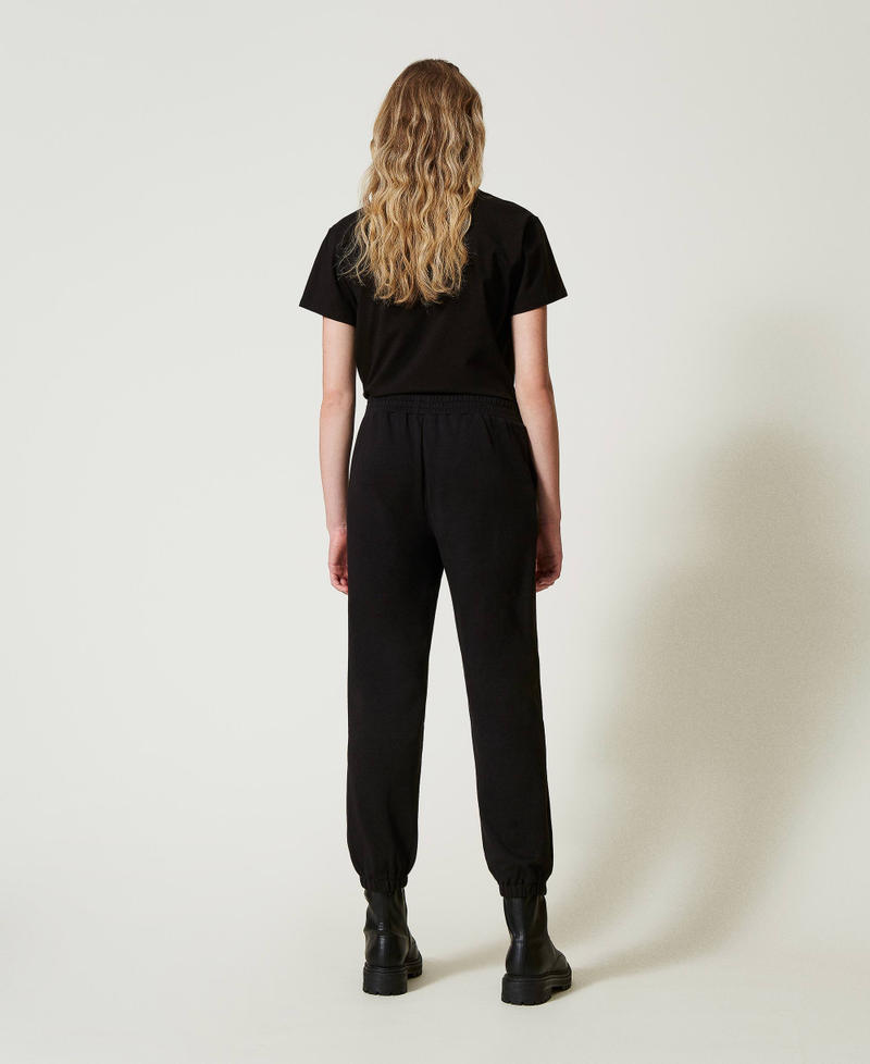 Scee by twin set Pantaloni joggers in felpa con raso Latest fashion