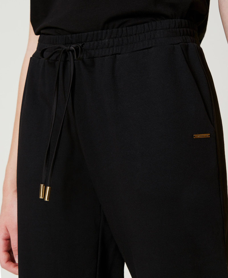 Scee by twin set Pantaloni joggers in felpa con raso Latest fashion