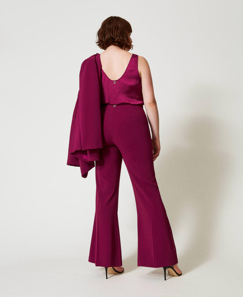 Scee by twin set Pantaloni flare con catena Oval T Fino al 50% di sconto