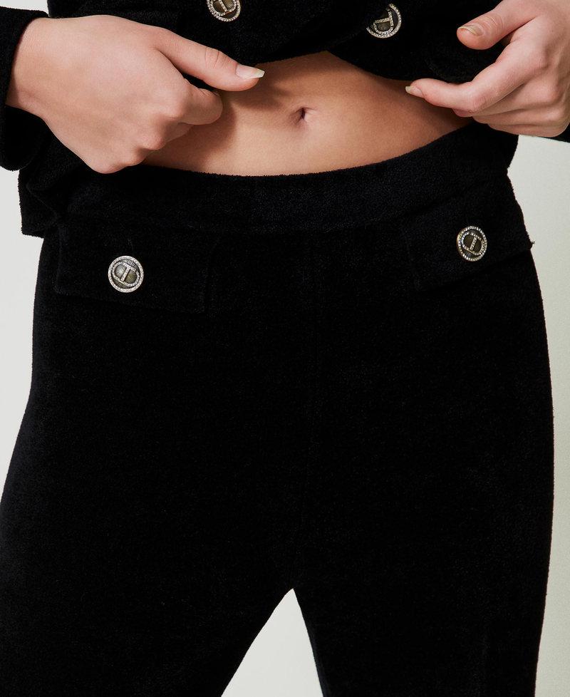 Scee by twin set Pantaloni flare in maglia con bottoni Oval T Enormi sconti