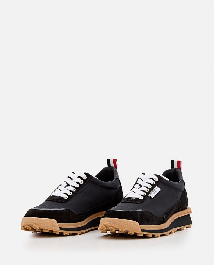 Thom Browne ALUMNI TRAINER IN TECH NYLON Ultimi tre giorni