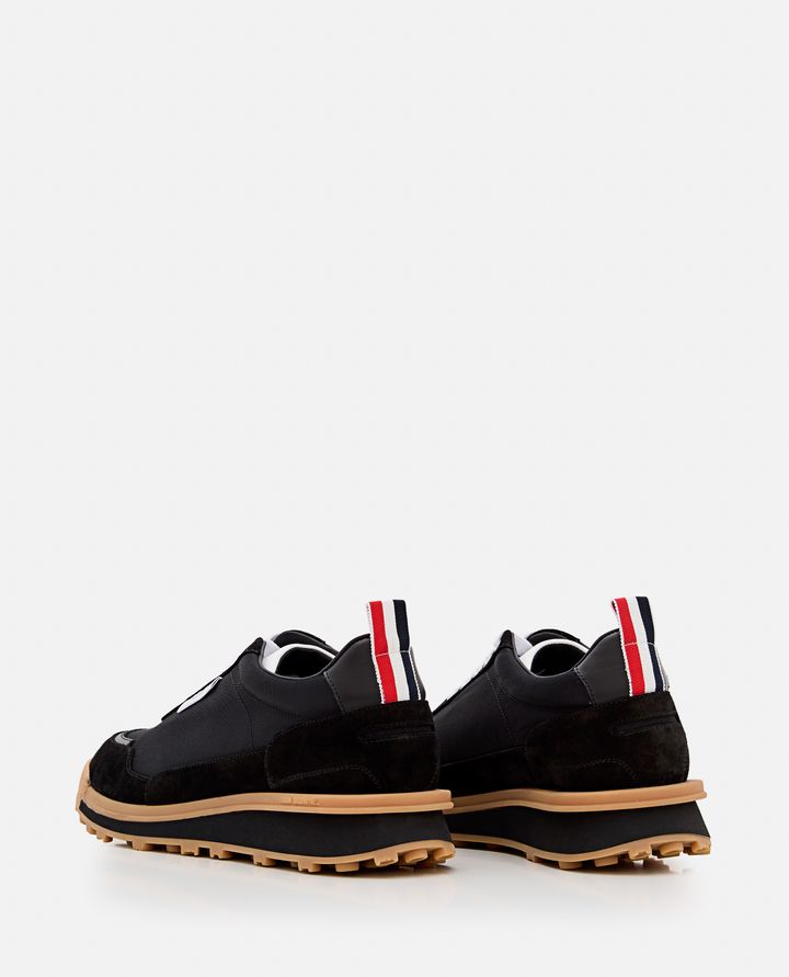 Thom Browne ALUMNI TRAINER IN TECH NYLON Ultimi tre giorni