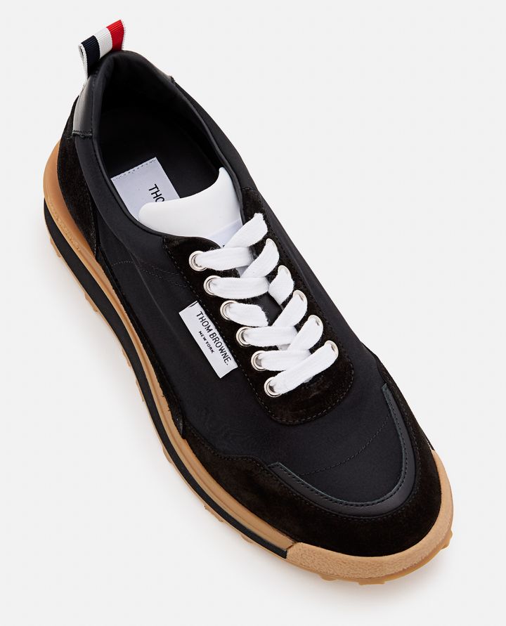 Thom Browne ALUMNI TRAINER IN TECH NYLON Ultimi tre giorni